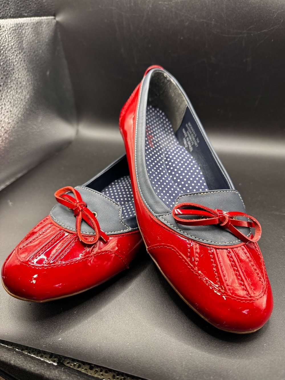 L.L. Bean Coastal Rain Skimmer flats in a glossy red and navy blue colorway feat